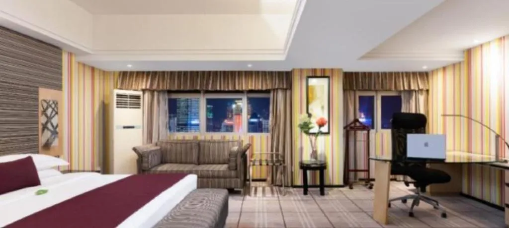 Bed in Nanning Sanzan Hotel