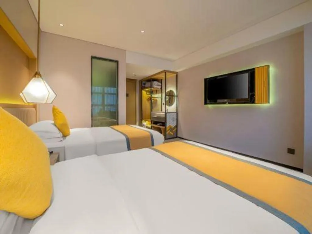 Bed in Nanning Sanzan Hotel