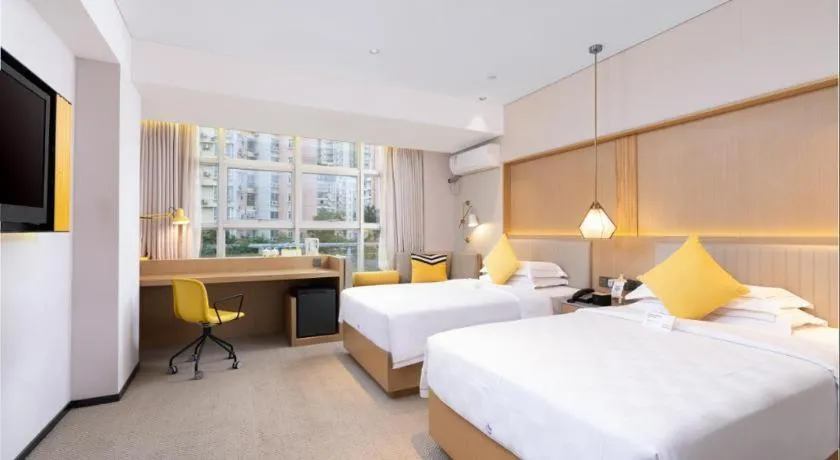 Bed in Nanning Sanzan Hotel