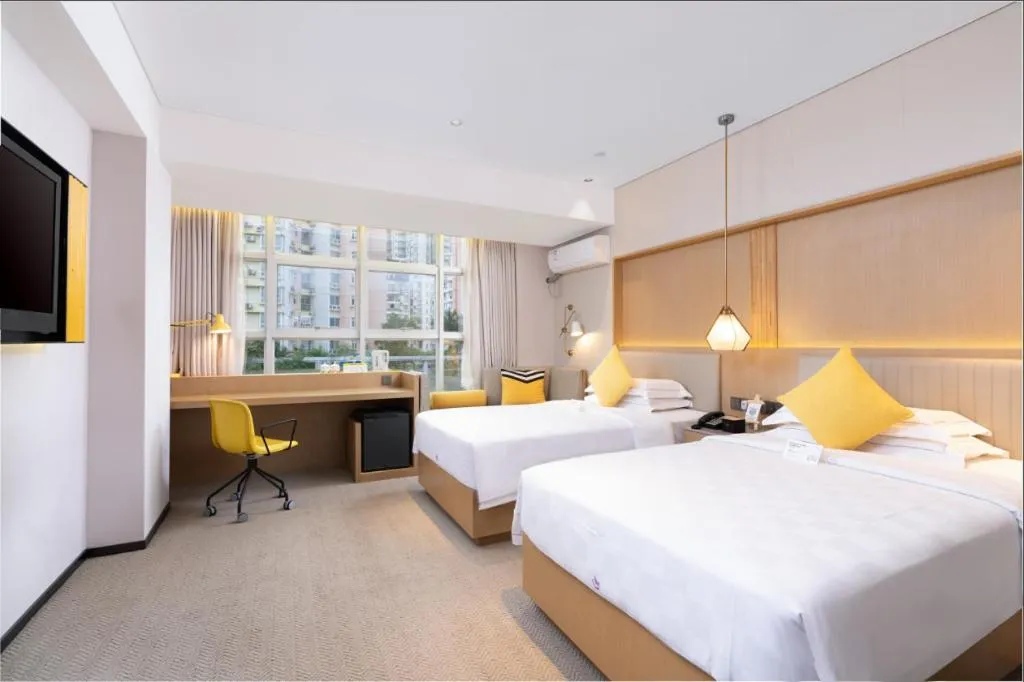 Bed in Nanning Sanzan Hotel