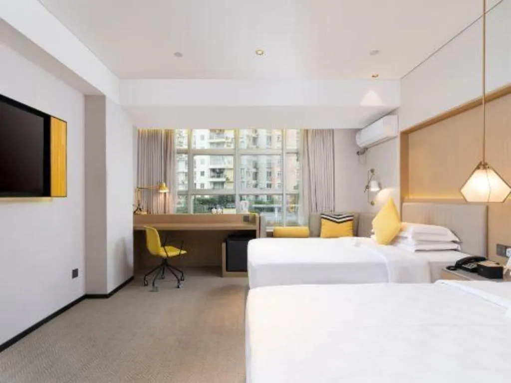 Bed in Nanning Sanzan Hotel