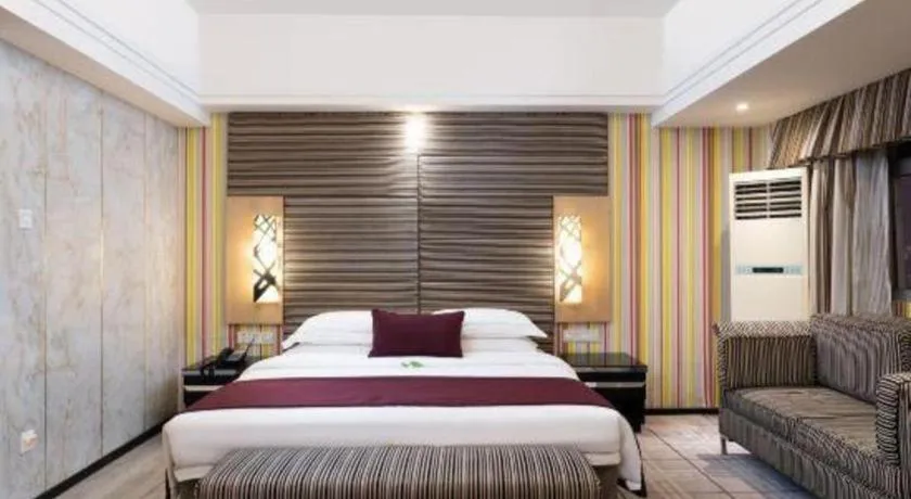 Bed in Nanning Sanzan Hotel