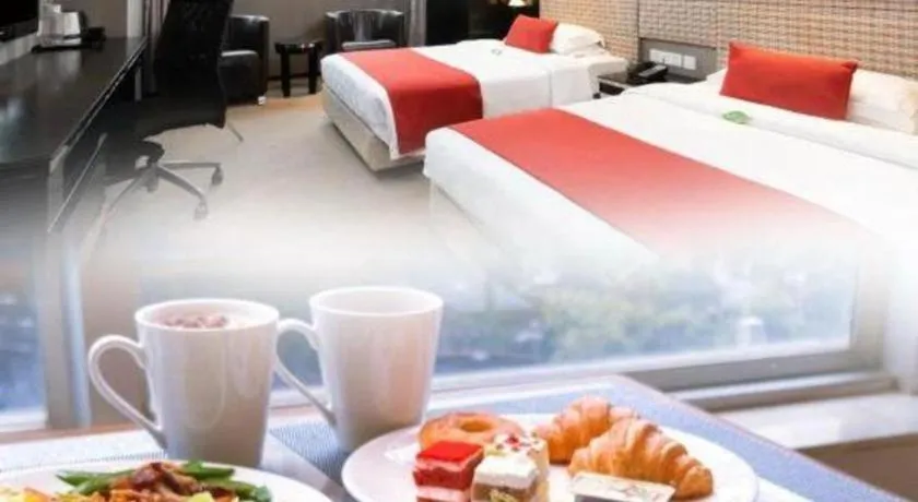 Bed in Nanning Sanzan Hotel