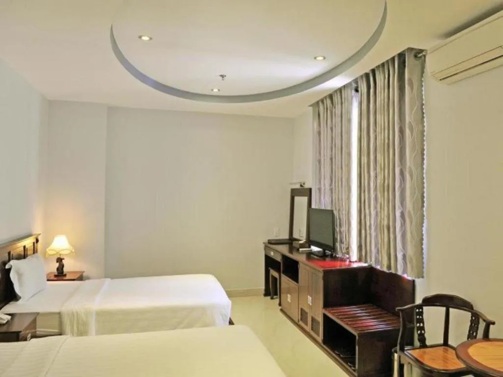 Bed in Phoenix Hotel Saigon