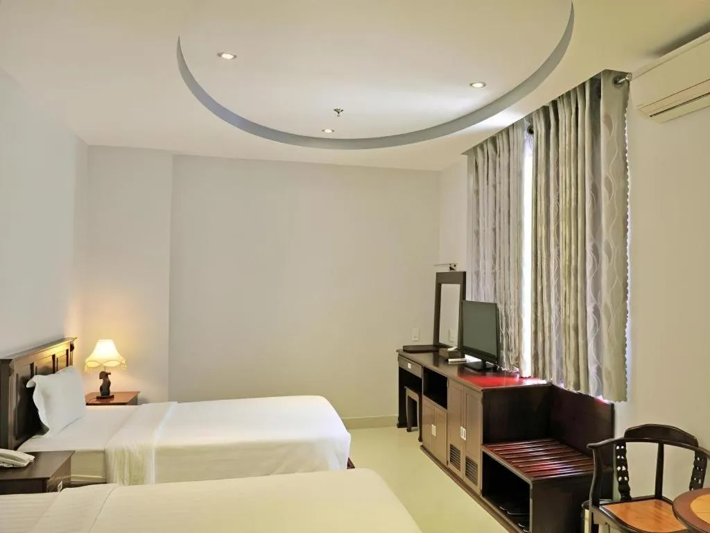 Bed in Phoenix Hotel Saigon