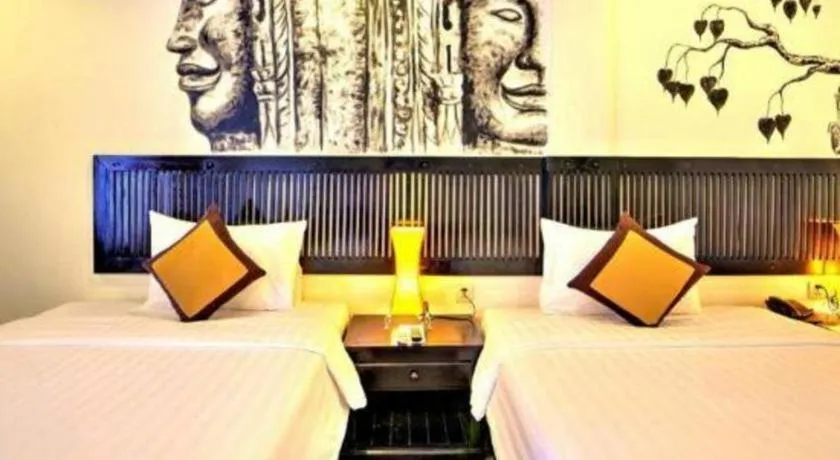 Bed in La Residence Blanc D' Angkor