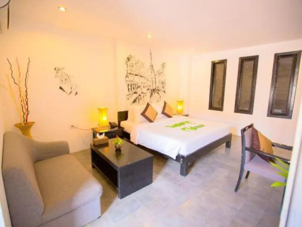 Bed in La Residence Blanc D' Angkor