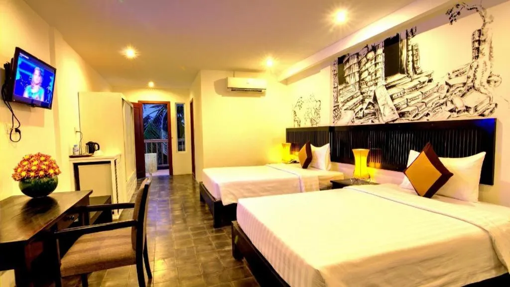 Bed in La Residence Blanc D' Angkor