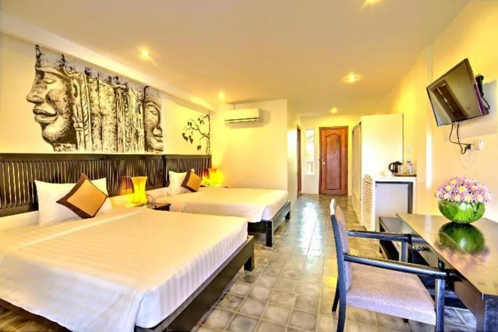 Bed in La Residence Blanc D' Angkor