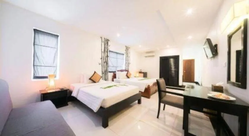 Bed in La Residence Blanc D' Angkor