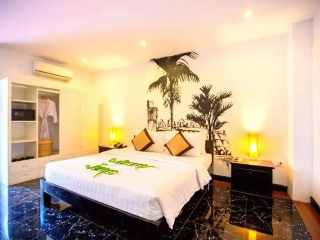 Bed in La Residence Blanc D' Angkor