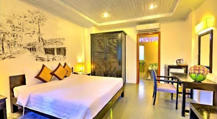 Bed in La Residence Blanc D' Angkor