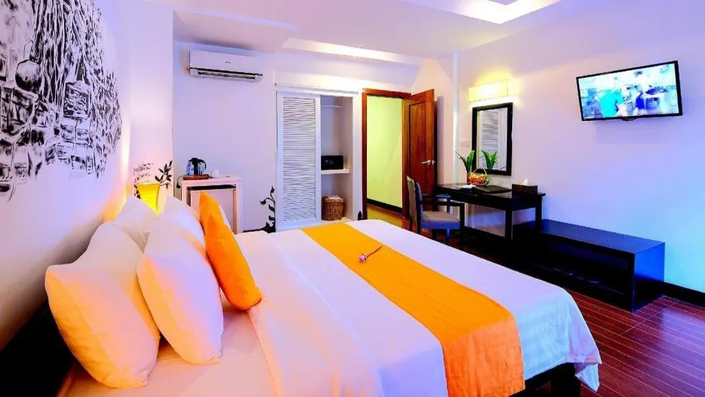 Bed in La Residence Blanc D' Angkor