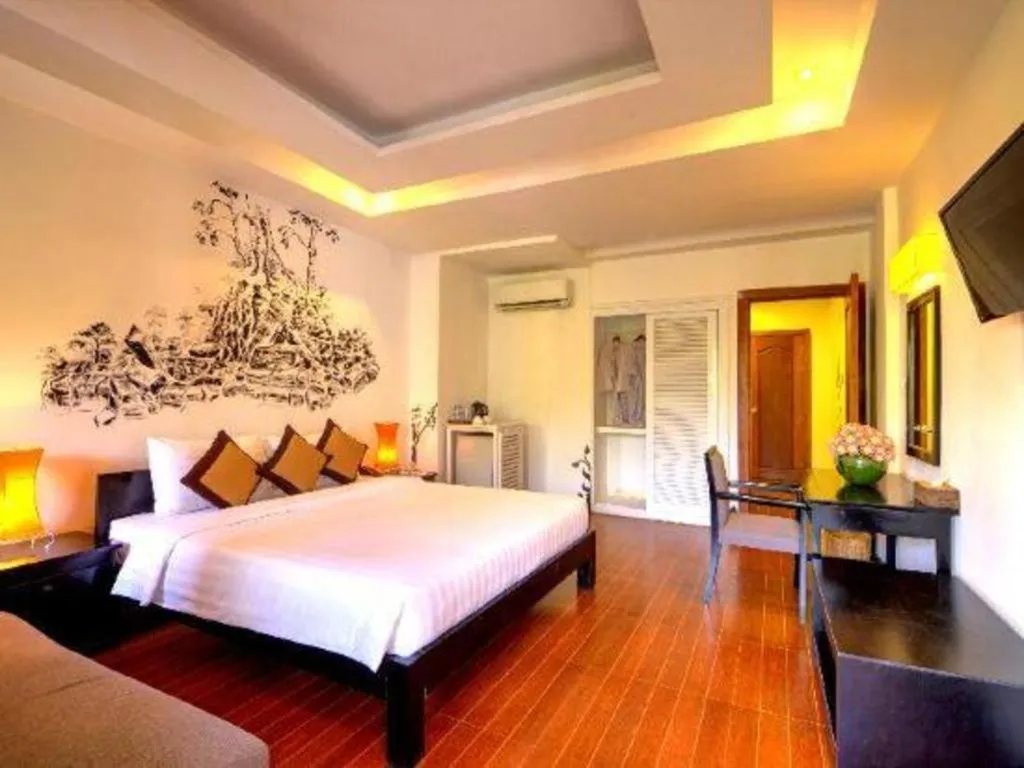 Bed in La Residence Blanc D' Angkor