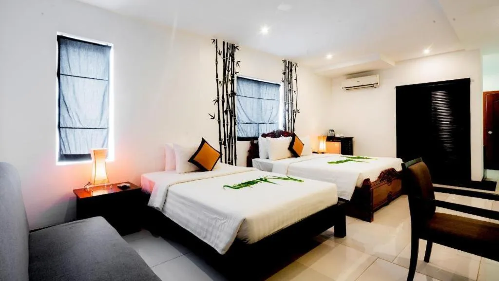 Bed in La Residence Blanc D' Angkor