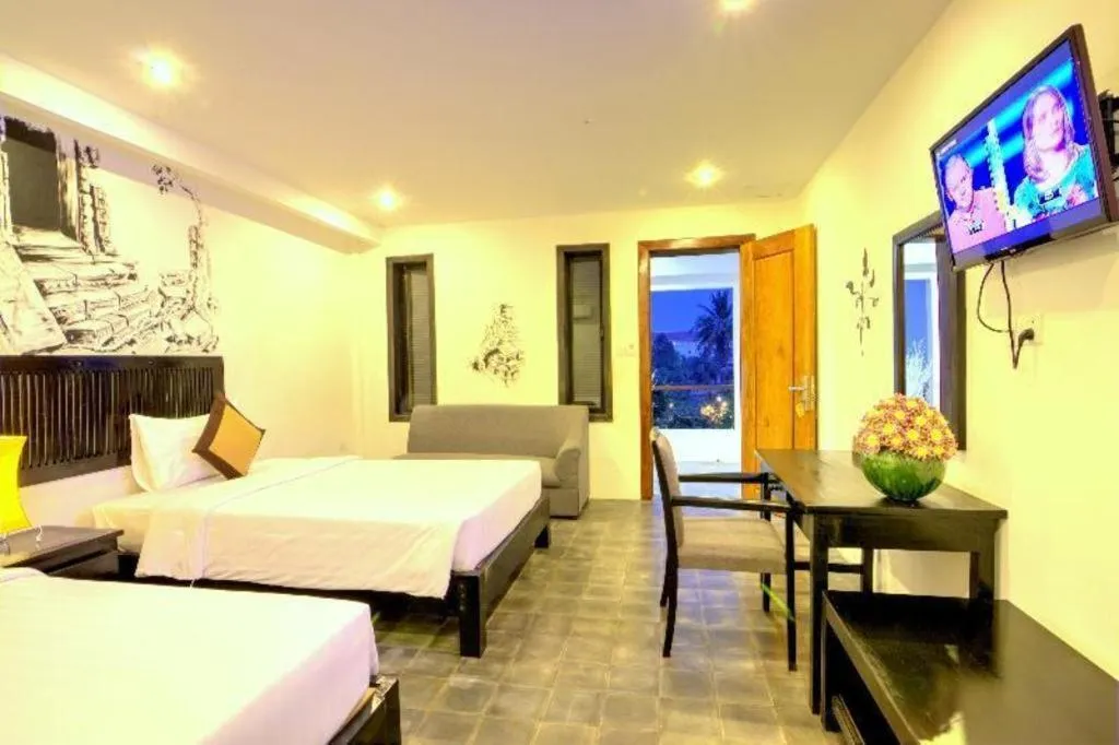 Bed in La Residence Blanc D' Angkor