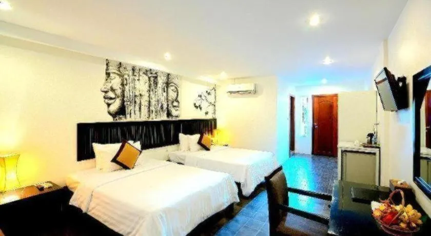 Bed in La Residence Blanc D' Angkor