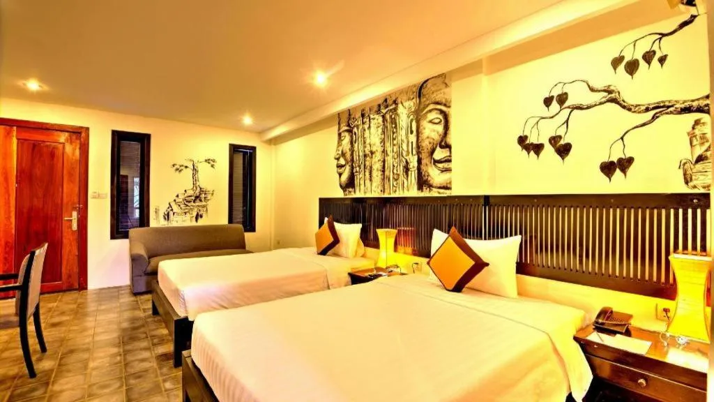 Bed in La Residence Blanc D' Angkor