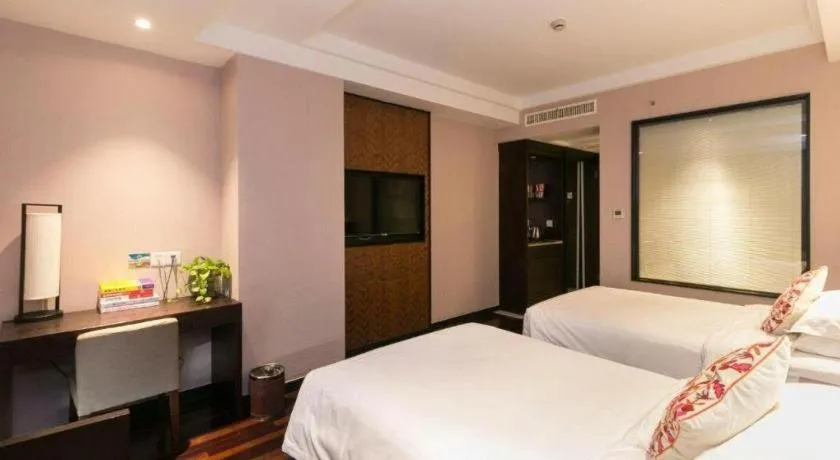 Bed in Yiwu Orange Boutique Hotel