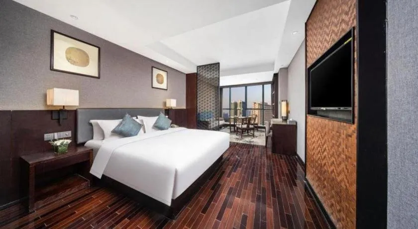 Bed in Yiwu Orange Boutique Hotel