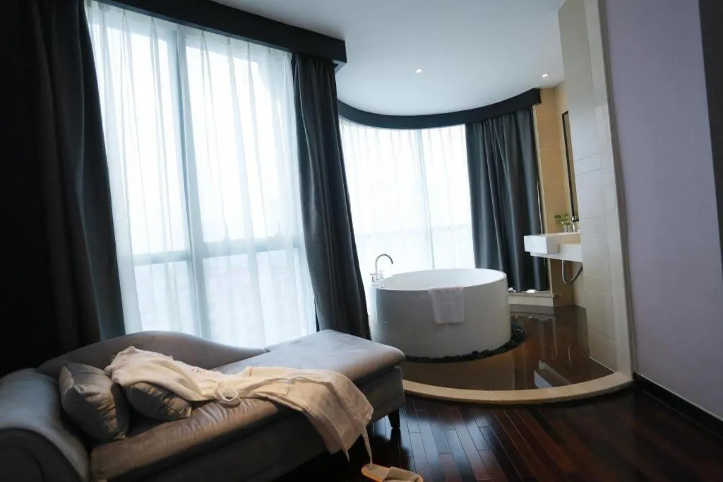 Bed in Yiwu Orange Boutique Hotel