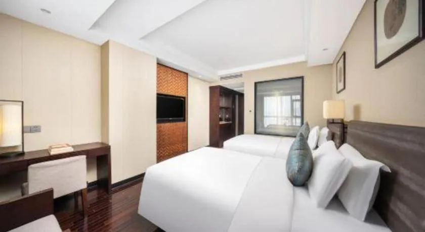 Bed in Yiwu Orange Boutique Hotel