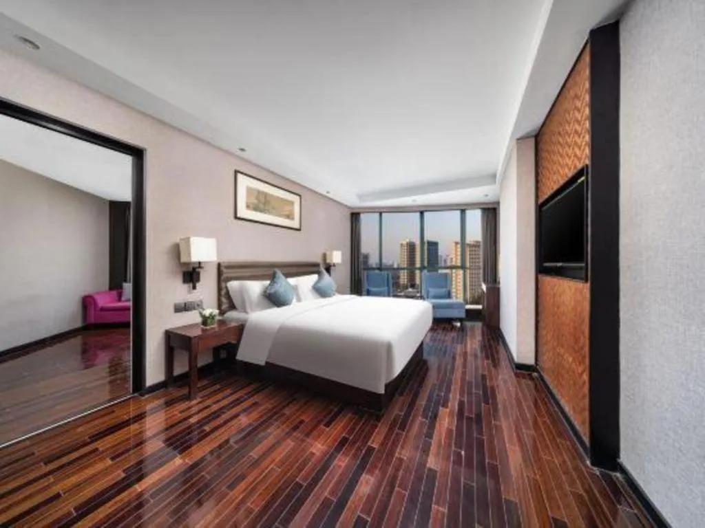 Bed in Yiwu Orange Boutique Hotel