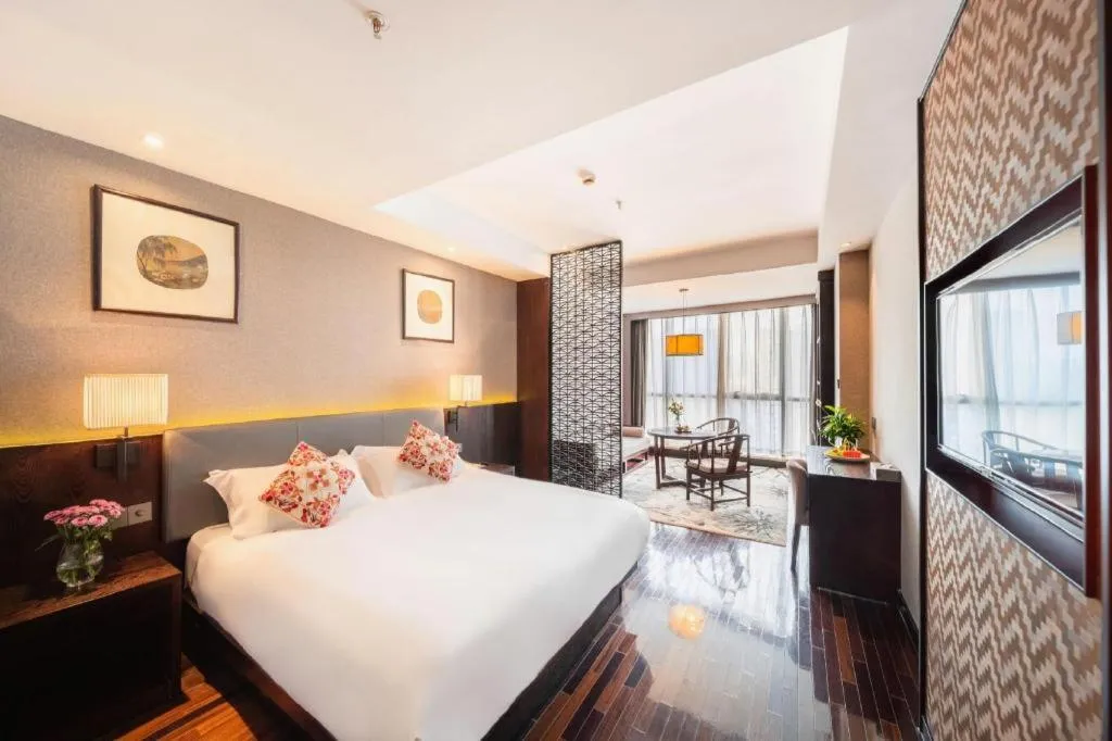 Bed in Yiwu Orange Boutique Hotel