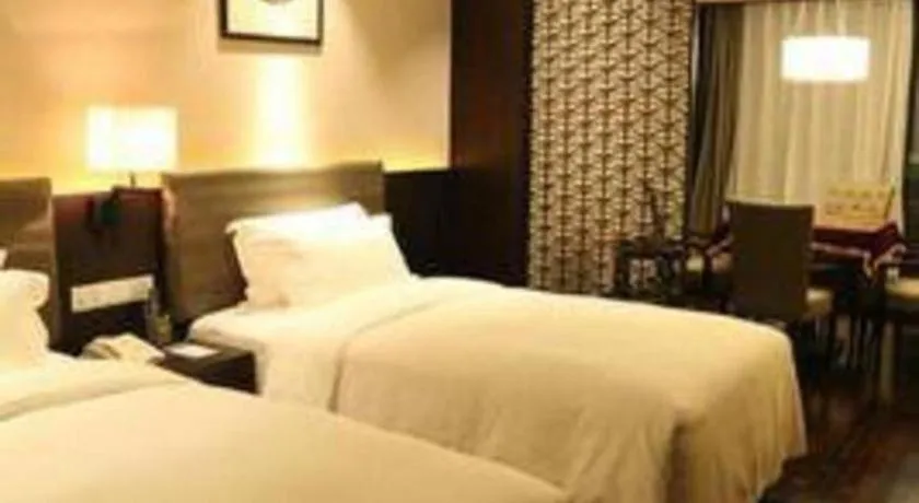 Bed in Yiwu Orange Boutique Hotel