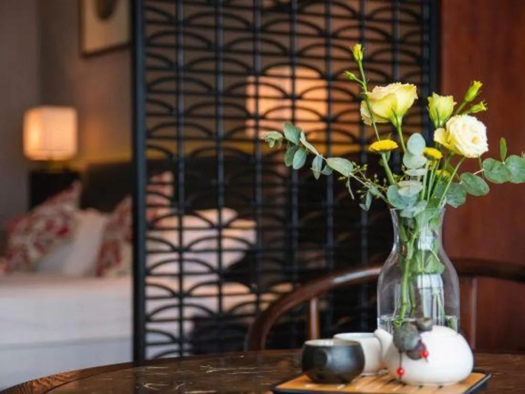 Bed in Yiwu Orange Boutique Hotel