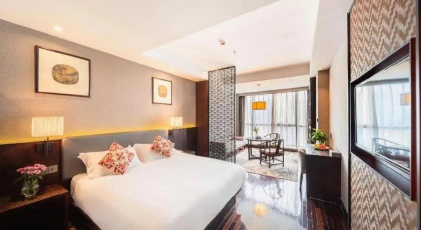 Bed in Yiwu Orange Boutique Hotel