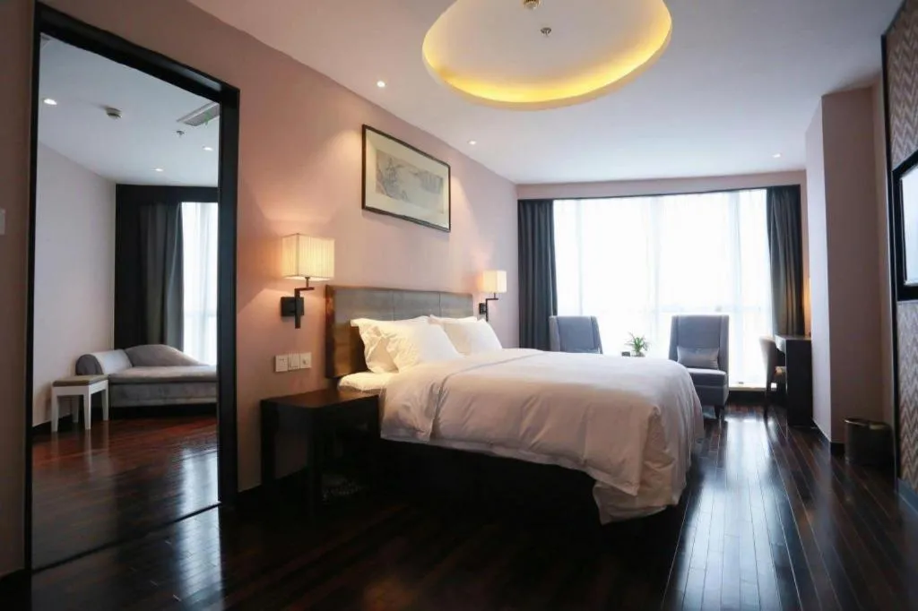 Bed in Yiwu Orange Boutique Hotel