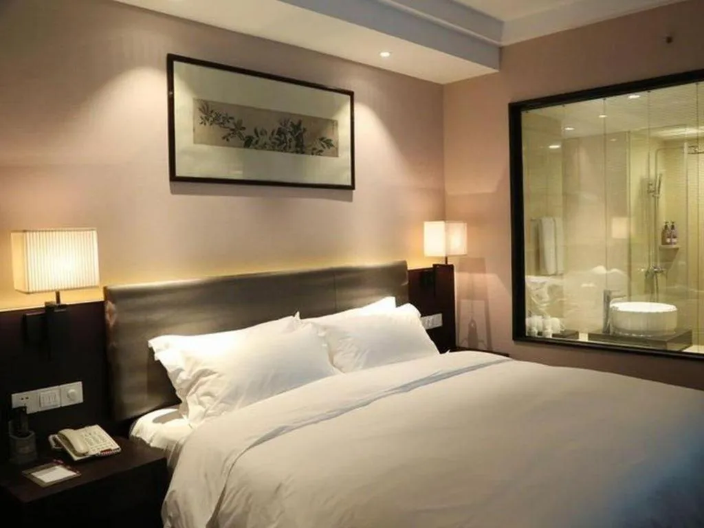 Bed in Yiwu Orange Boutique Hotel
