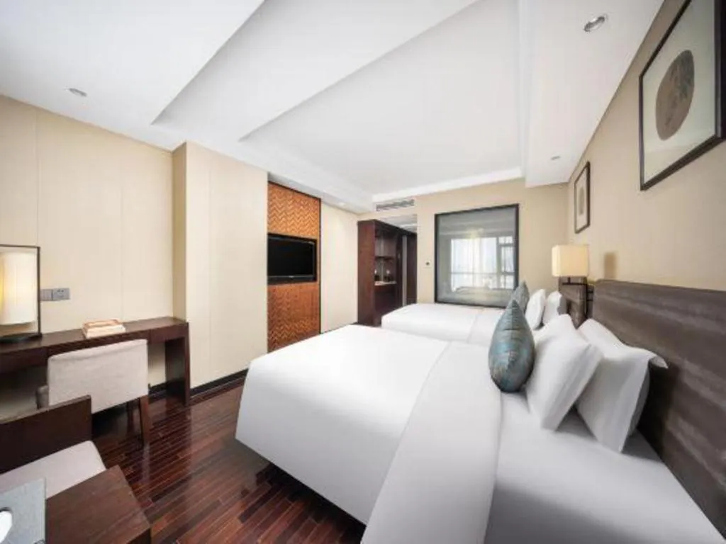 Bed in Yiwu Orange Boutique Hotel