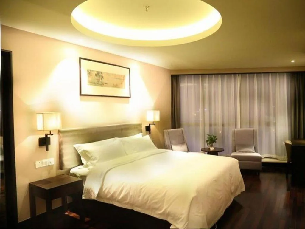 Bed in Yiwu Orange Boutique Hotel