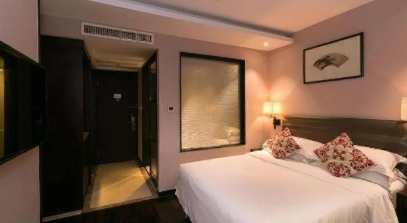 Bed in Yiwu Orange Boutique Hotel