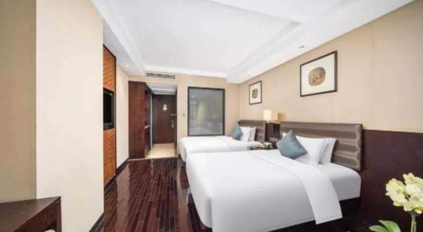 Bed in Yiwu Orange Boutique Hotel