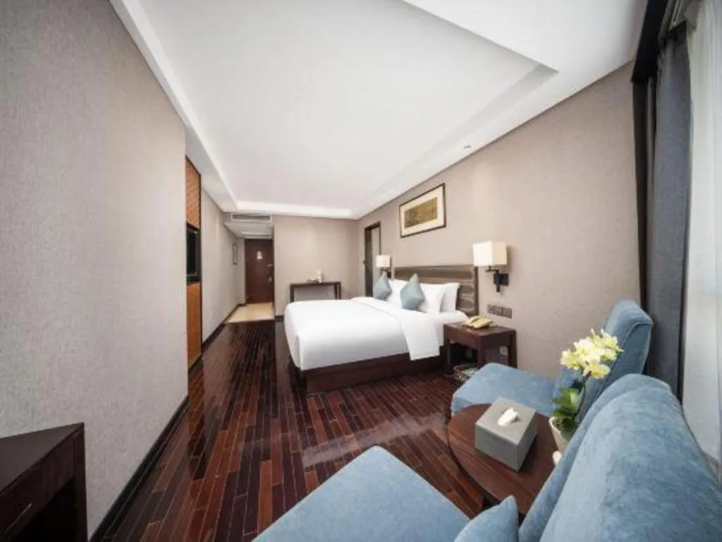 Bed in Yiwu Orange Boutique Hotel