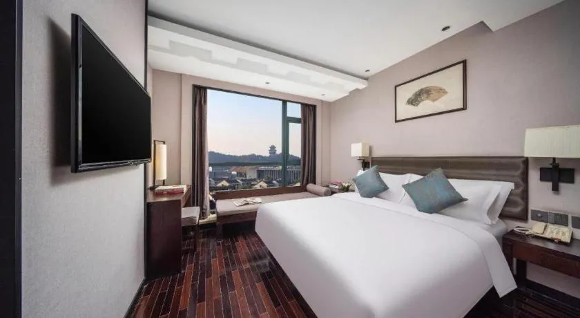 Bed in Yiwu Orange Boutique Hotel