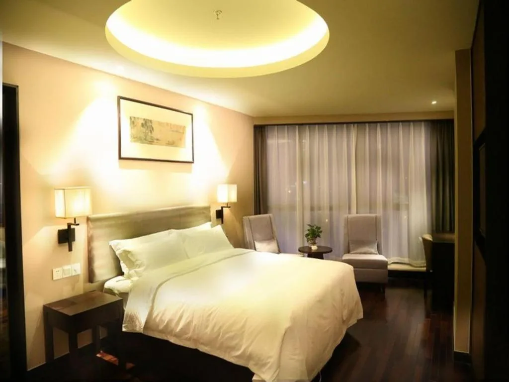 Bed in Yiwu Orange Boutique Hotel