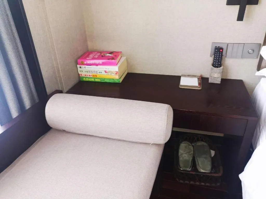 Bed in Yiwu Orange Boutique Hotel