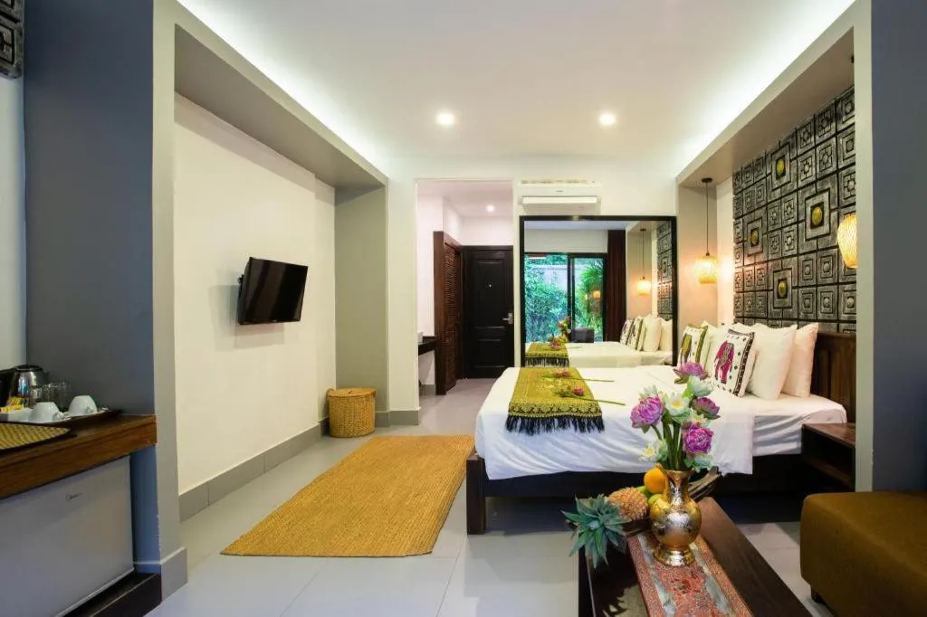 Bed in Ladear Angkor Boutique Hotel