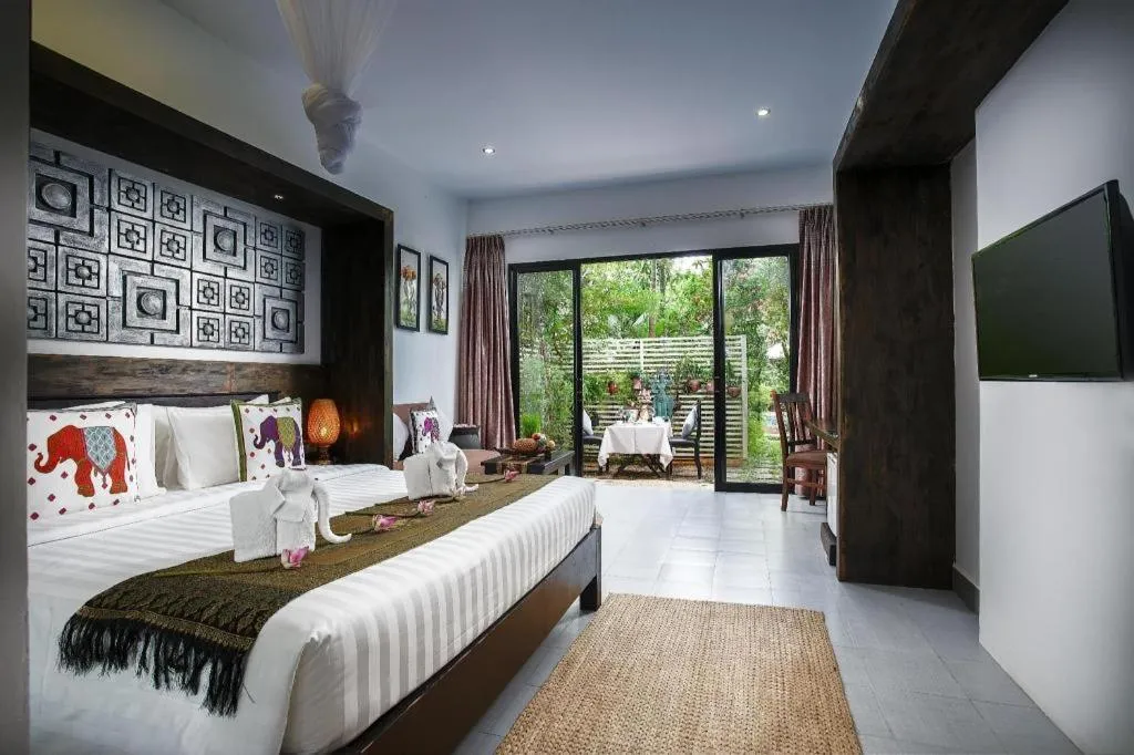 Bed in Ladear Angkor Boutique Hotel