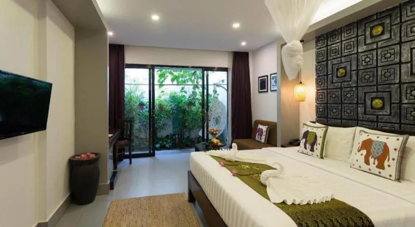 Bed in Ladear Angkor Boutique Hotel