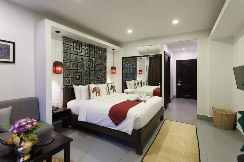 Bed in Ladear Angkor Boutique Hotel