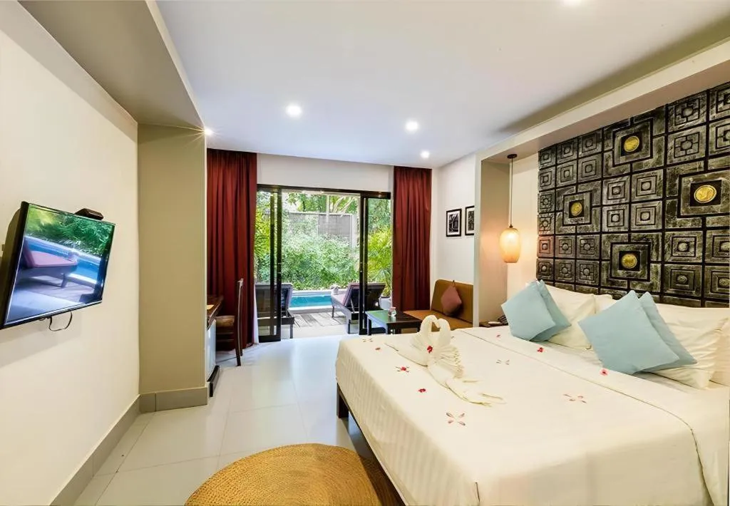 Bed in Ladear Angkor Boutique Hotel