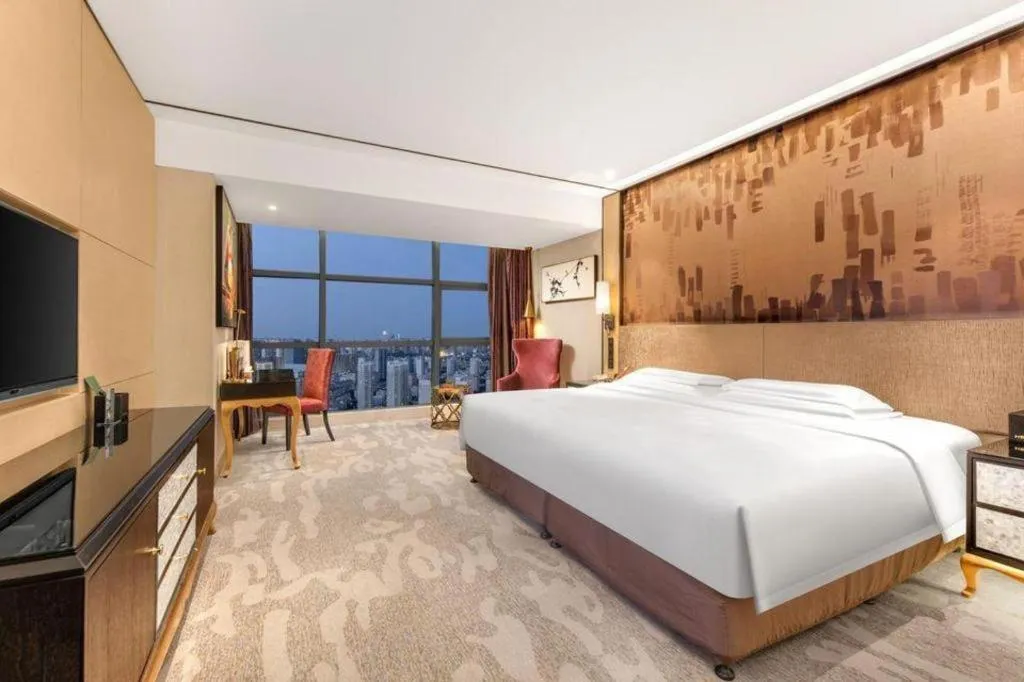 Bed in Shijiazhuang Ximeijin Continental Hotel