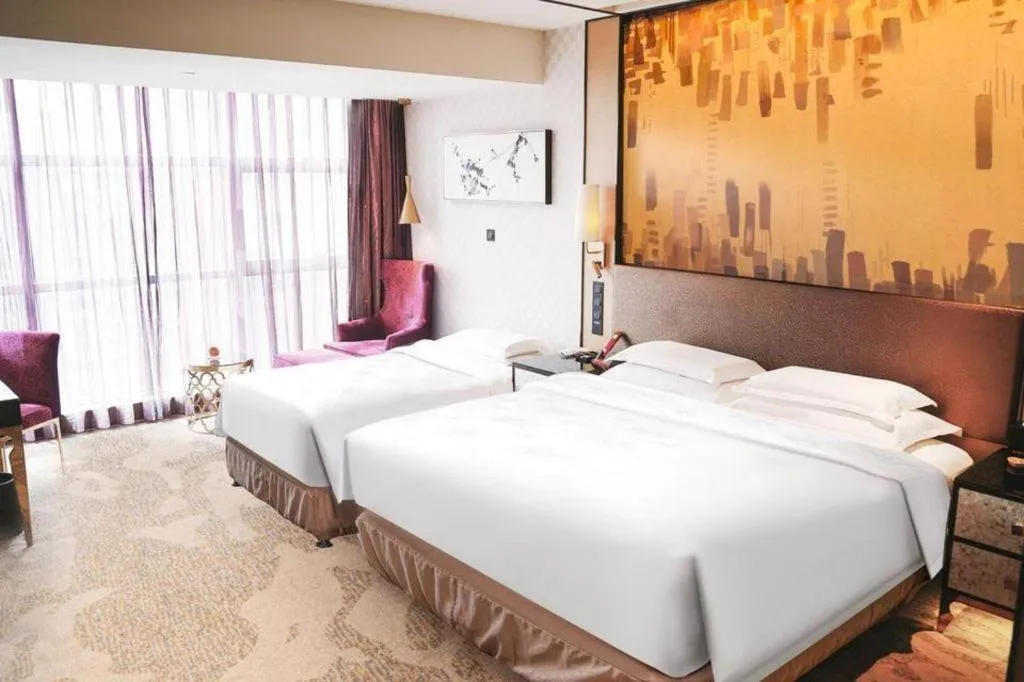 Bed in Shijiazhuang Ximeijin Continental Hotel