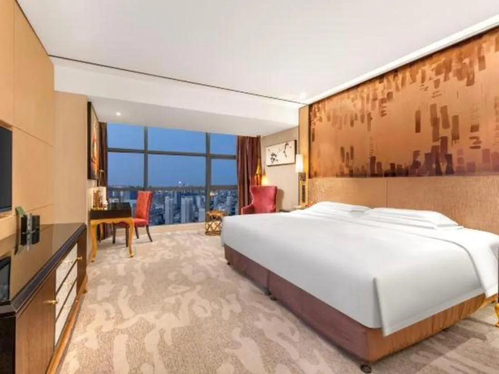 Bed in Shijiazhuang Ximeijin Continental Hotel