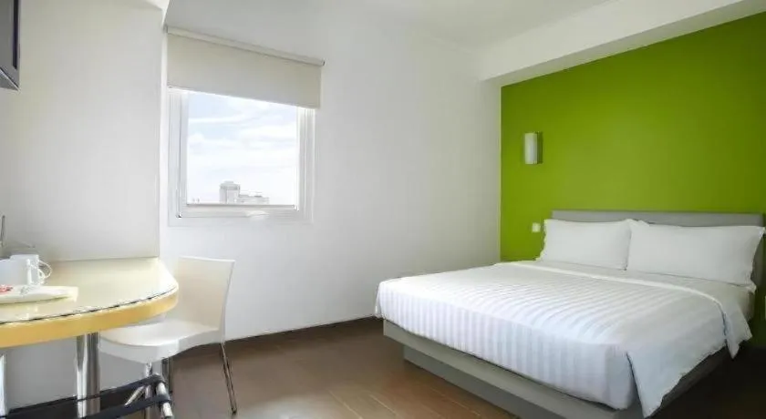 Bed in Amaris Hotel La Codefin Kemang